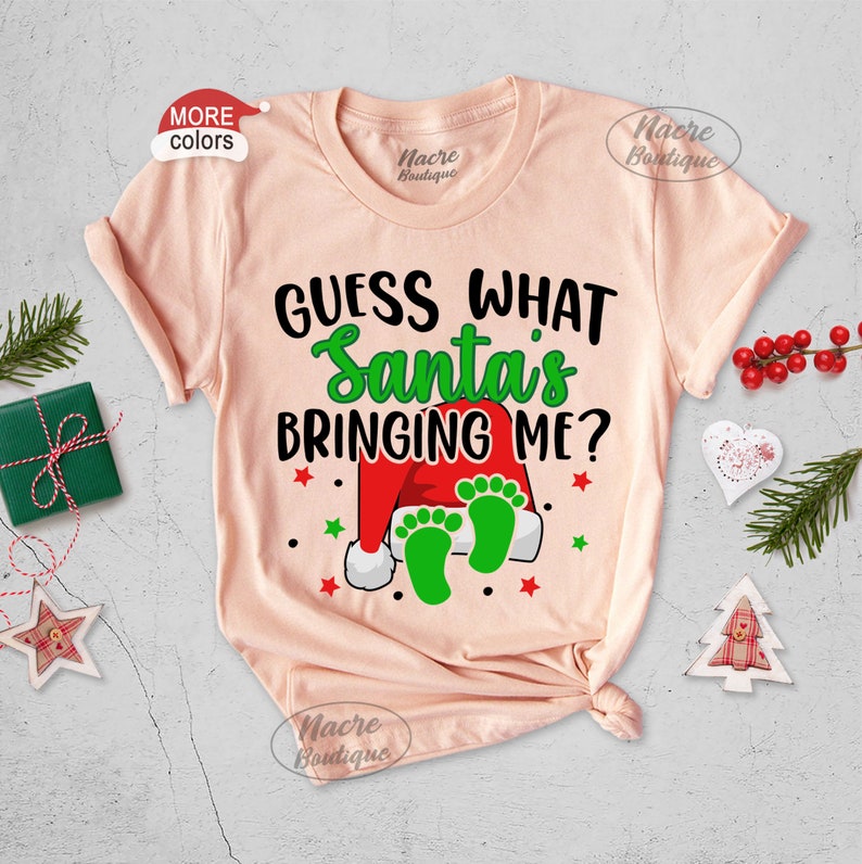 Guess What Santa Is Bringing Me Shirt, Christmas Pregnancy Announcement Shirt, Holiday Maternity Shirt, Mom To Be Christmas Shirt